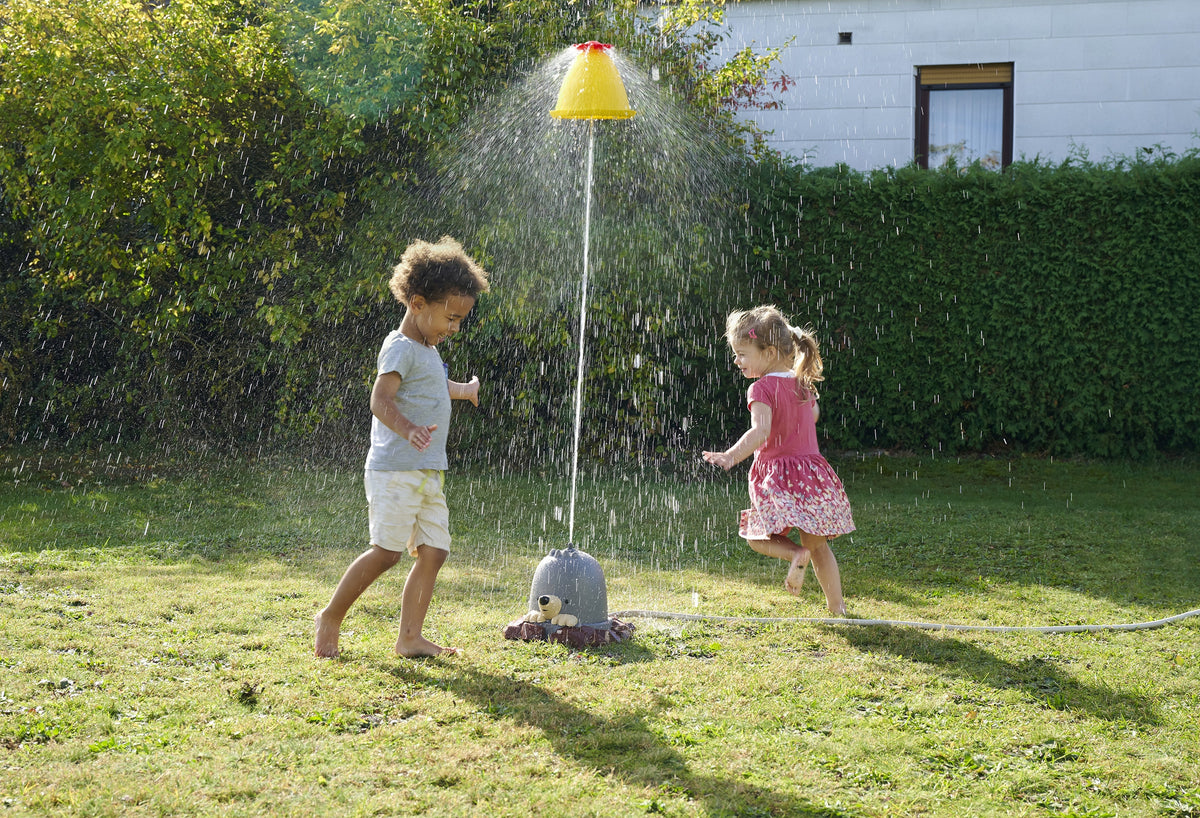 Mole water sprinkler with stable base and hose connector