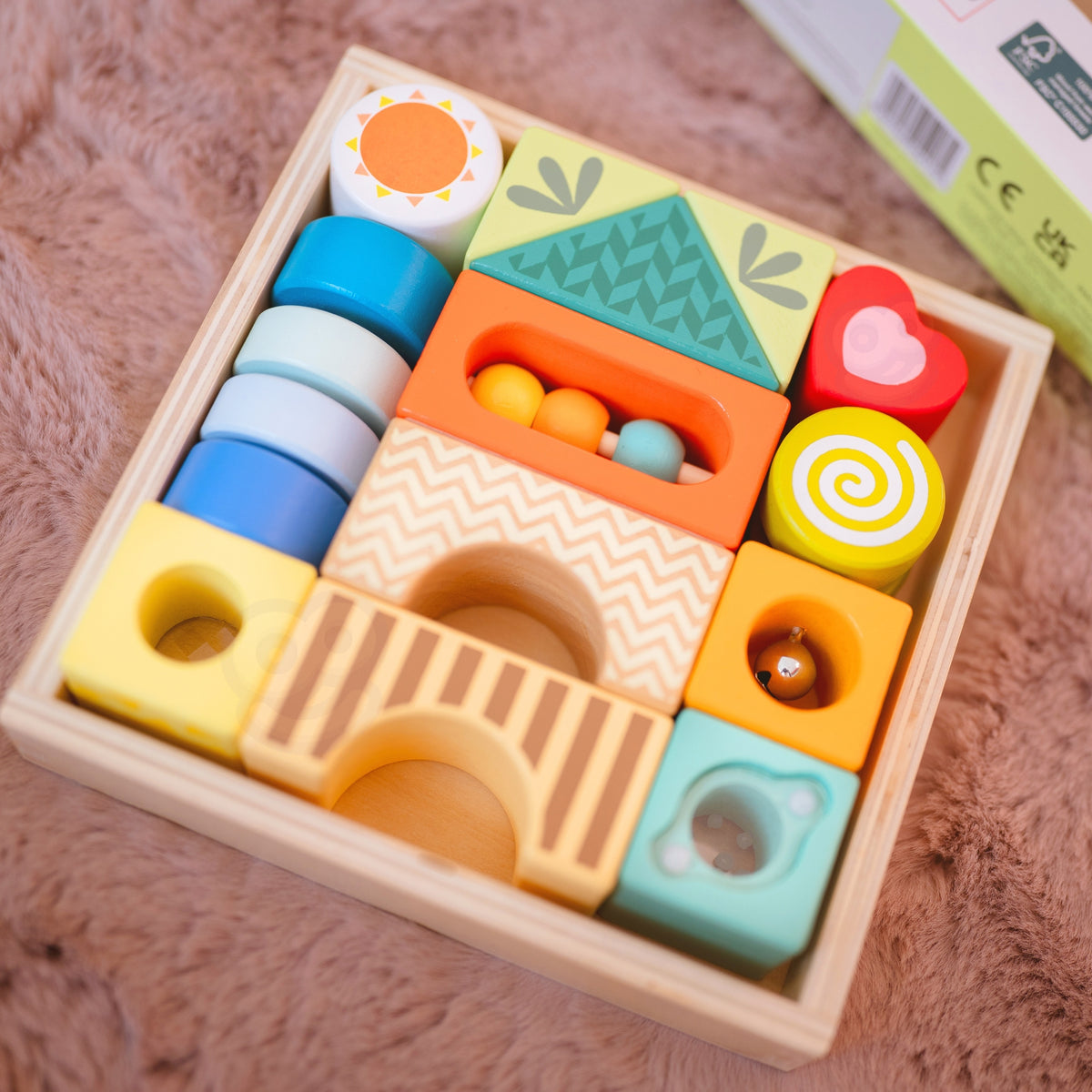 Wooden blocks with sounds, textures and shapes to explore