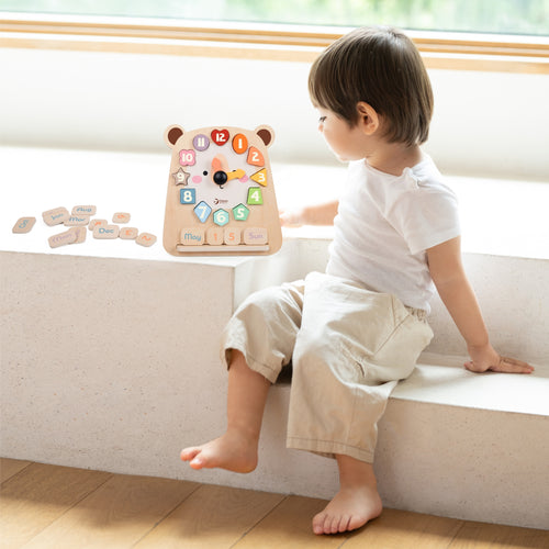 Teddy bear clock with removable coloured number shapes