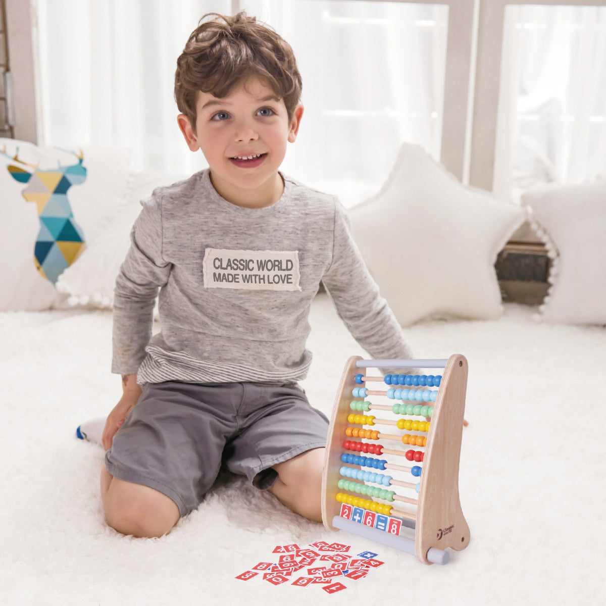 Child solving an addition problem on the abacus