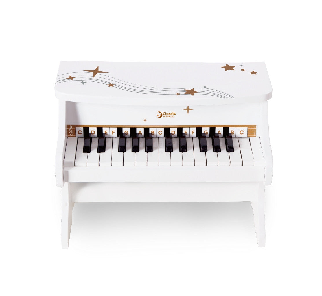 Classic World white piano – child at the piano