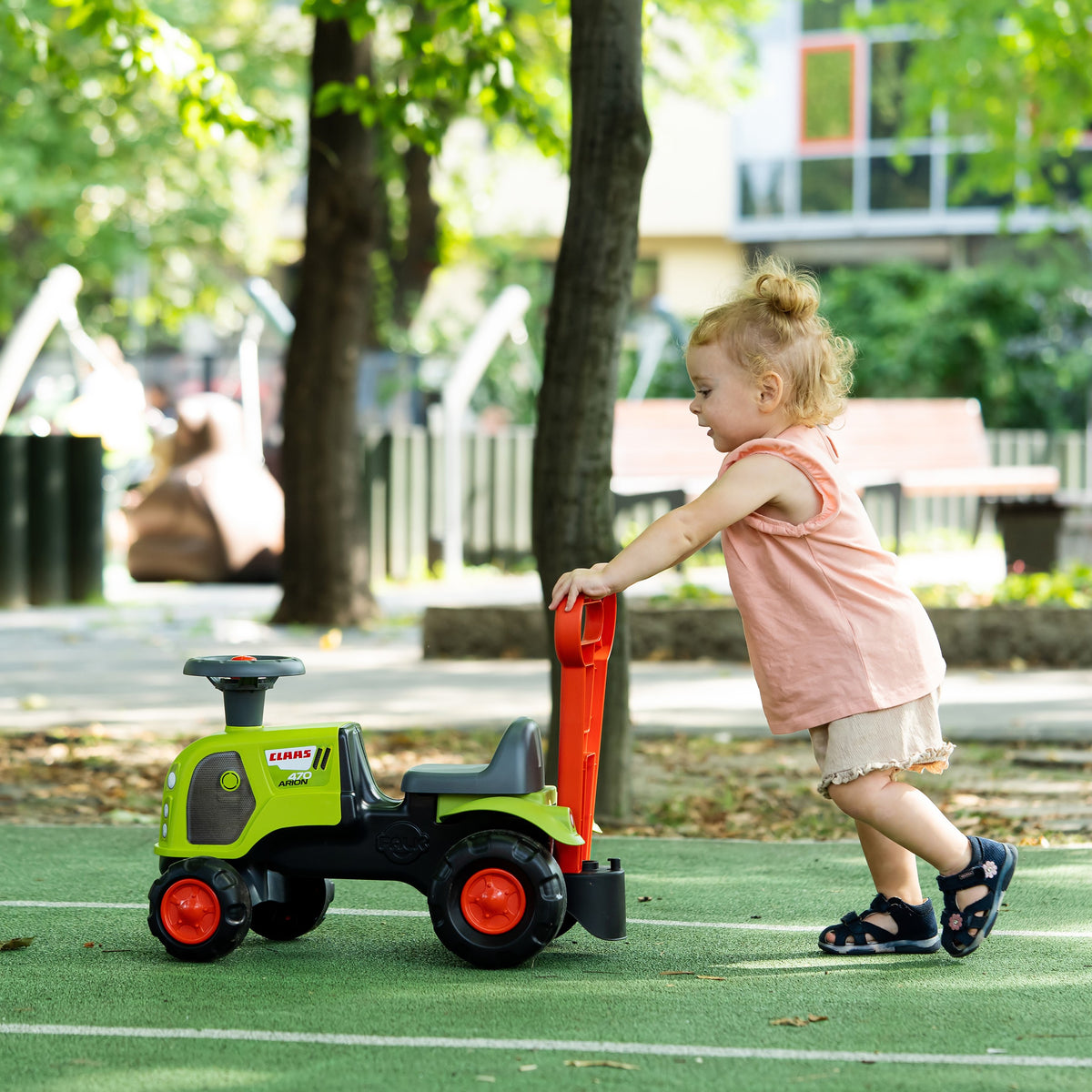 FALK Baby Claas traktors – bērns uz traktora