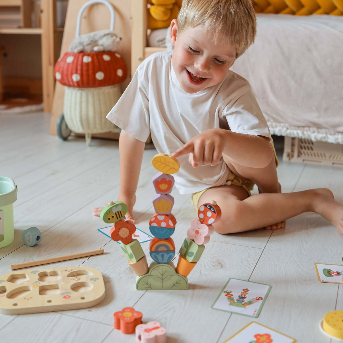 Shape and colour sorter on the wooden box lid