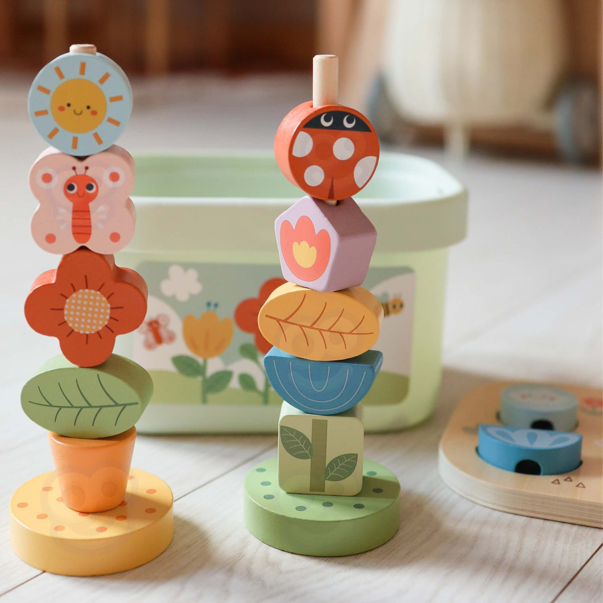 Stacking towers built from wooden pattern cards