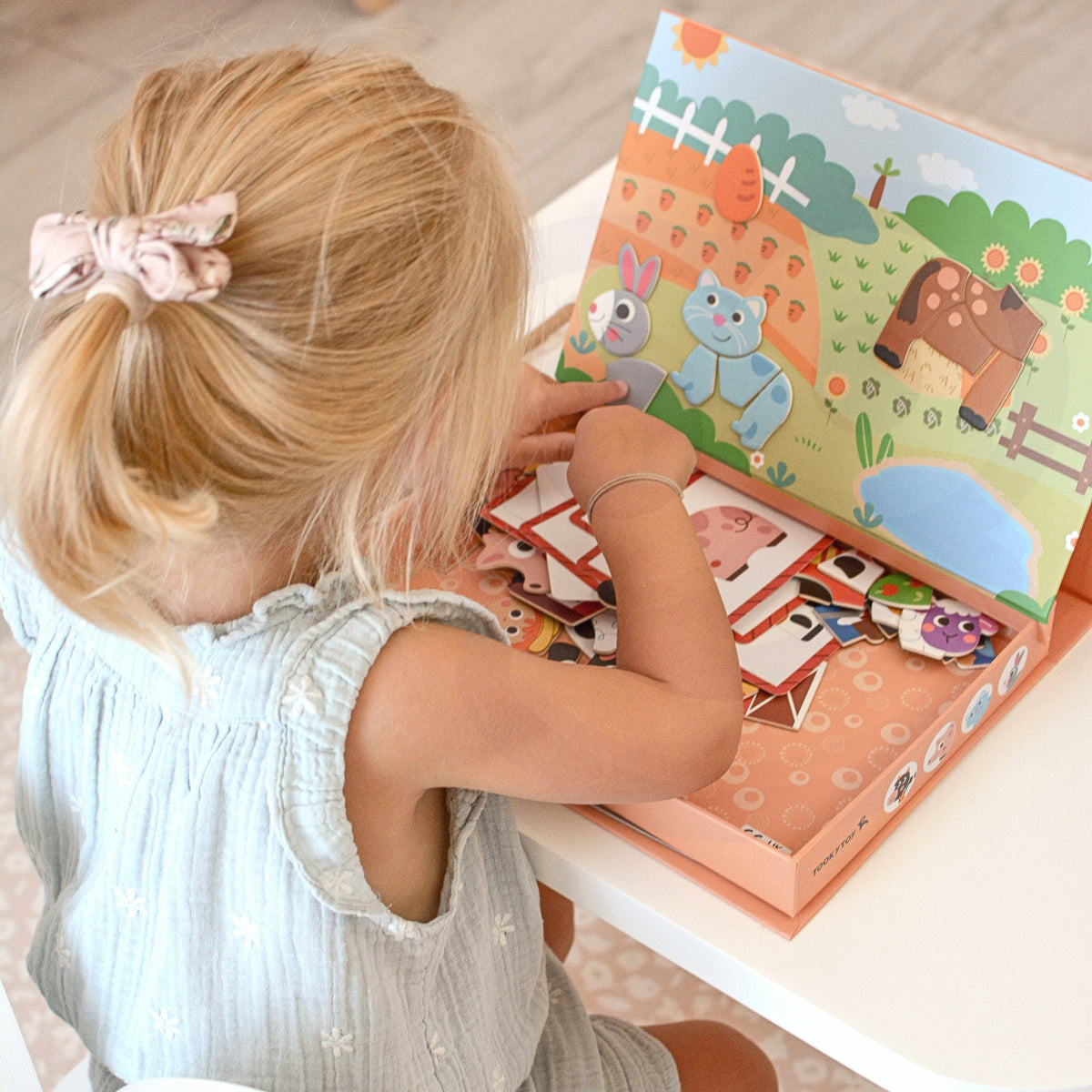 Farm scene built on the magnetic background board