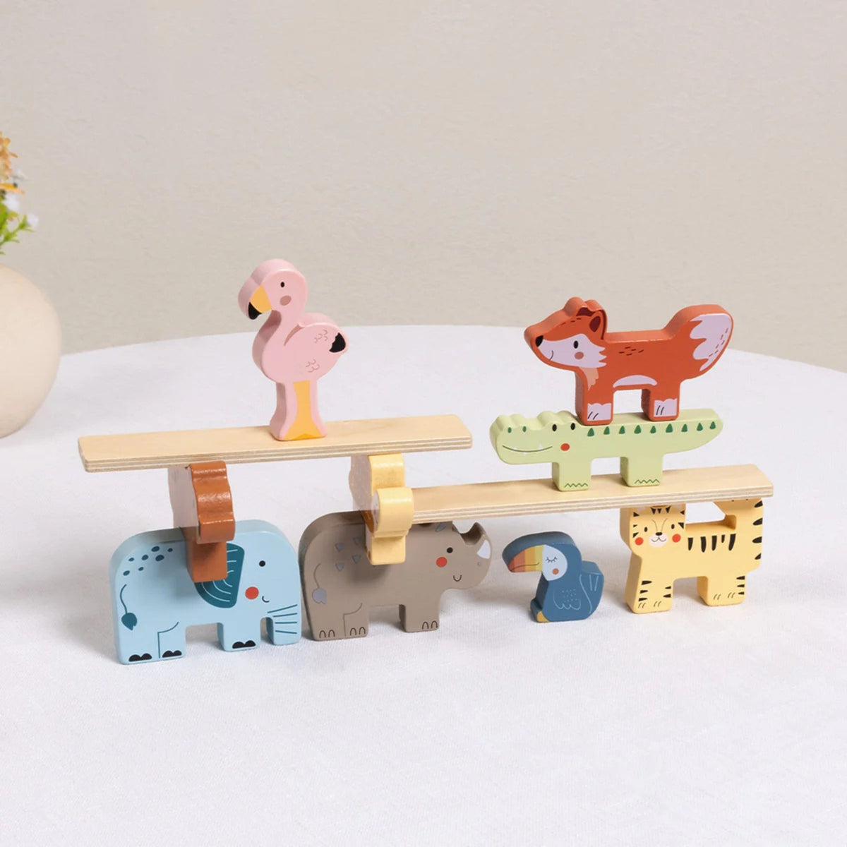 Animal stacking game stored in its fabric drawstring bag