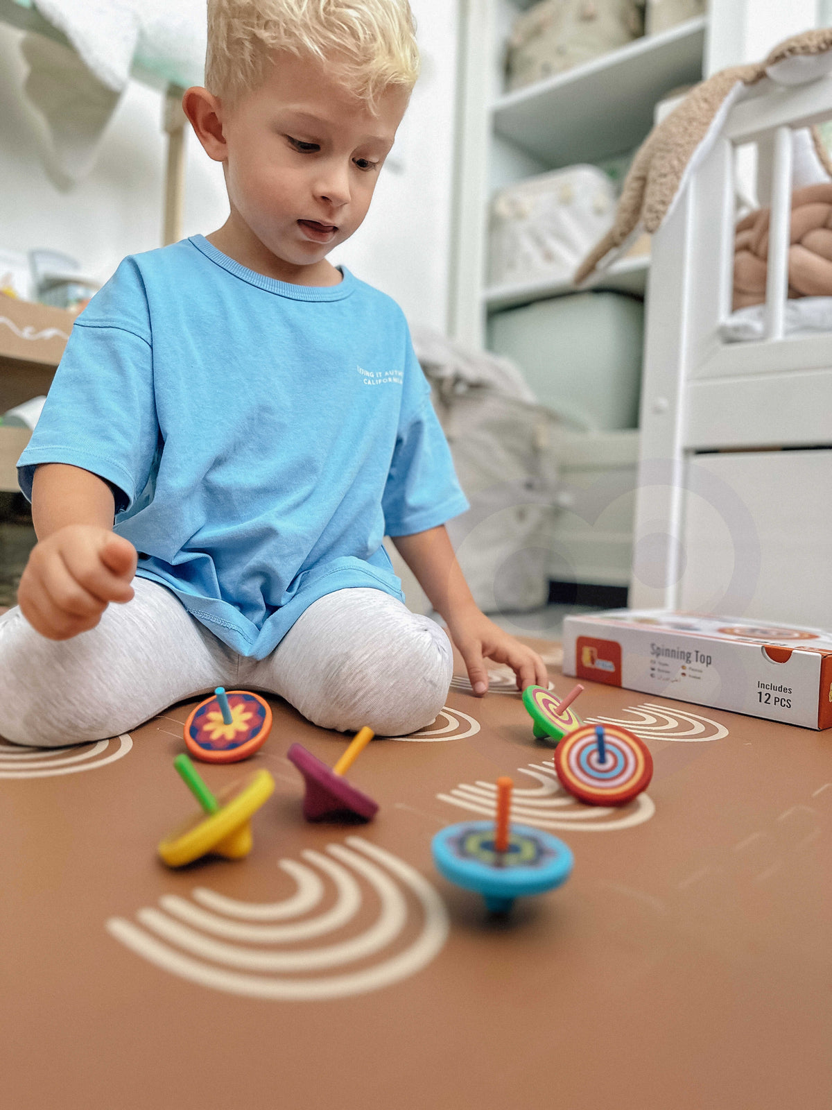 Six designs of the Viga wooden spinning top