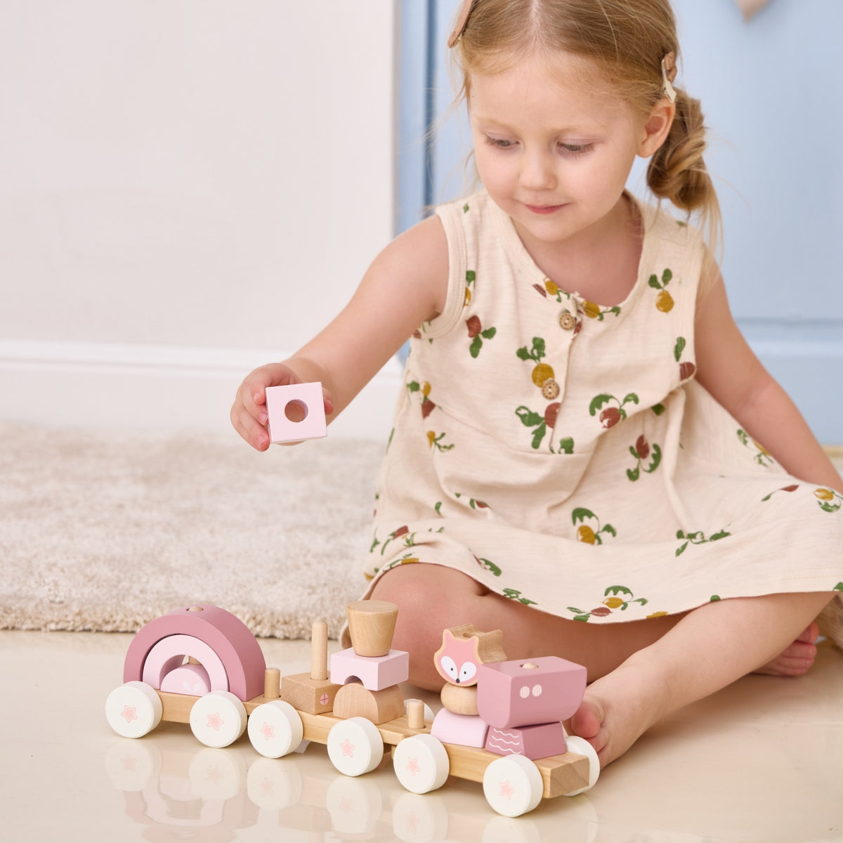 Soft coloured wooden blocks in different shapes