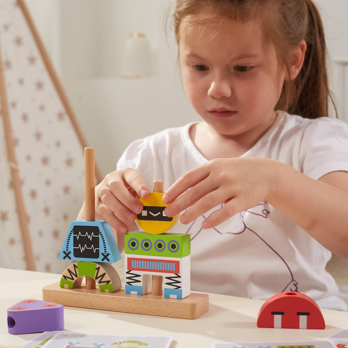 Viga wooden robot stacking puzzle – robot built on a pegged base