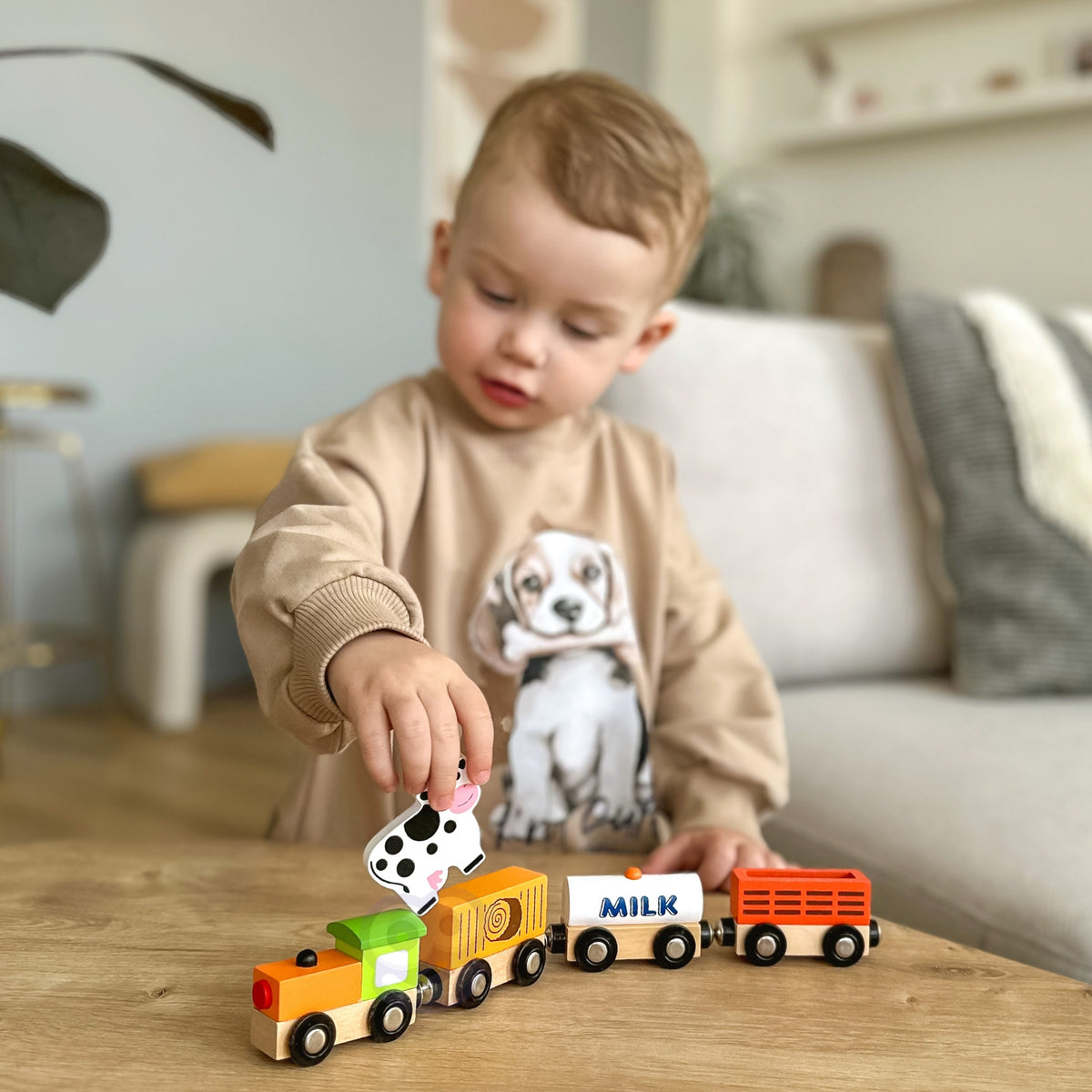 Wooden freight wagon with magnetic connectors