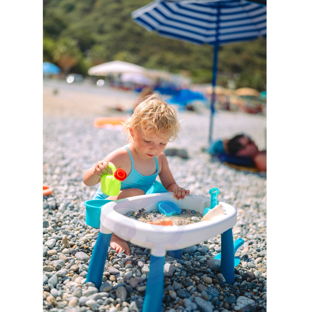 Play table with one side for sand and one for water