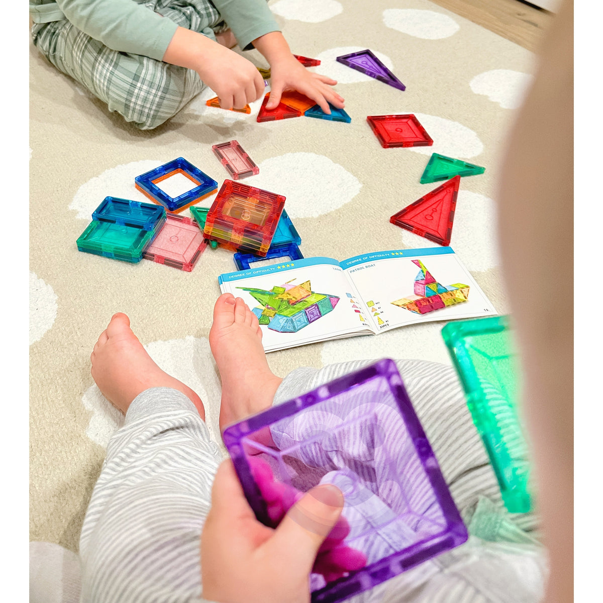 Long magnetic block snake laid out on the floor