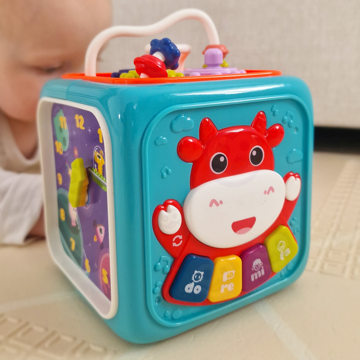 Textured panels on the activity cube for sensory play