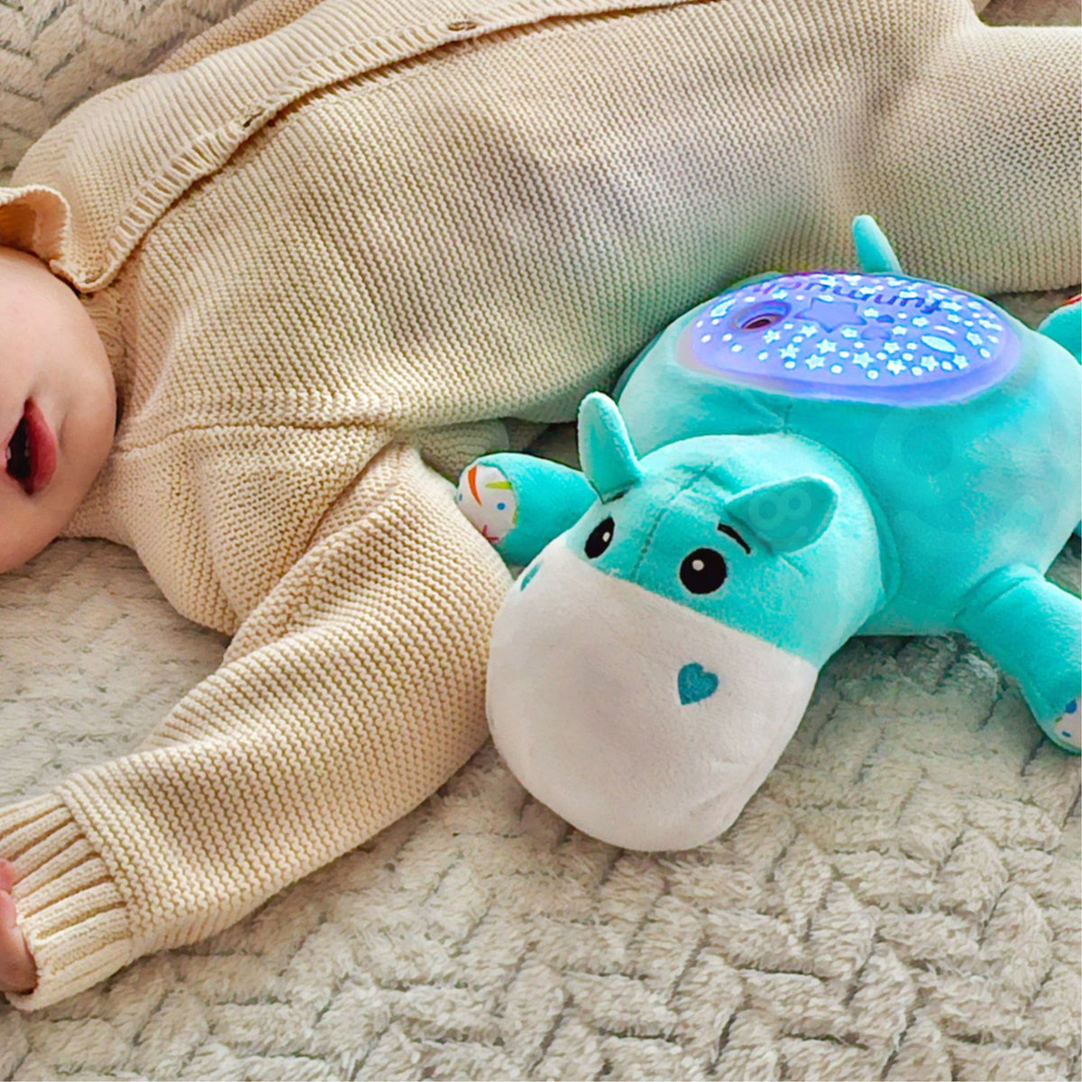 Woopie Baby miega nīlzirdziņš – maigi krāsaini gaismas raksti