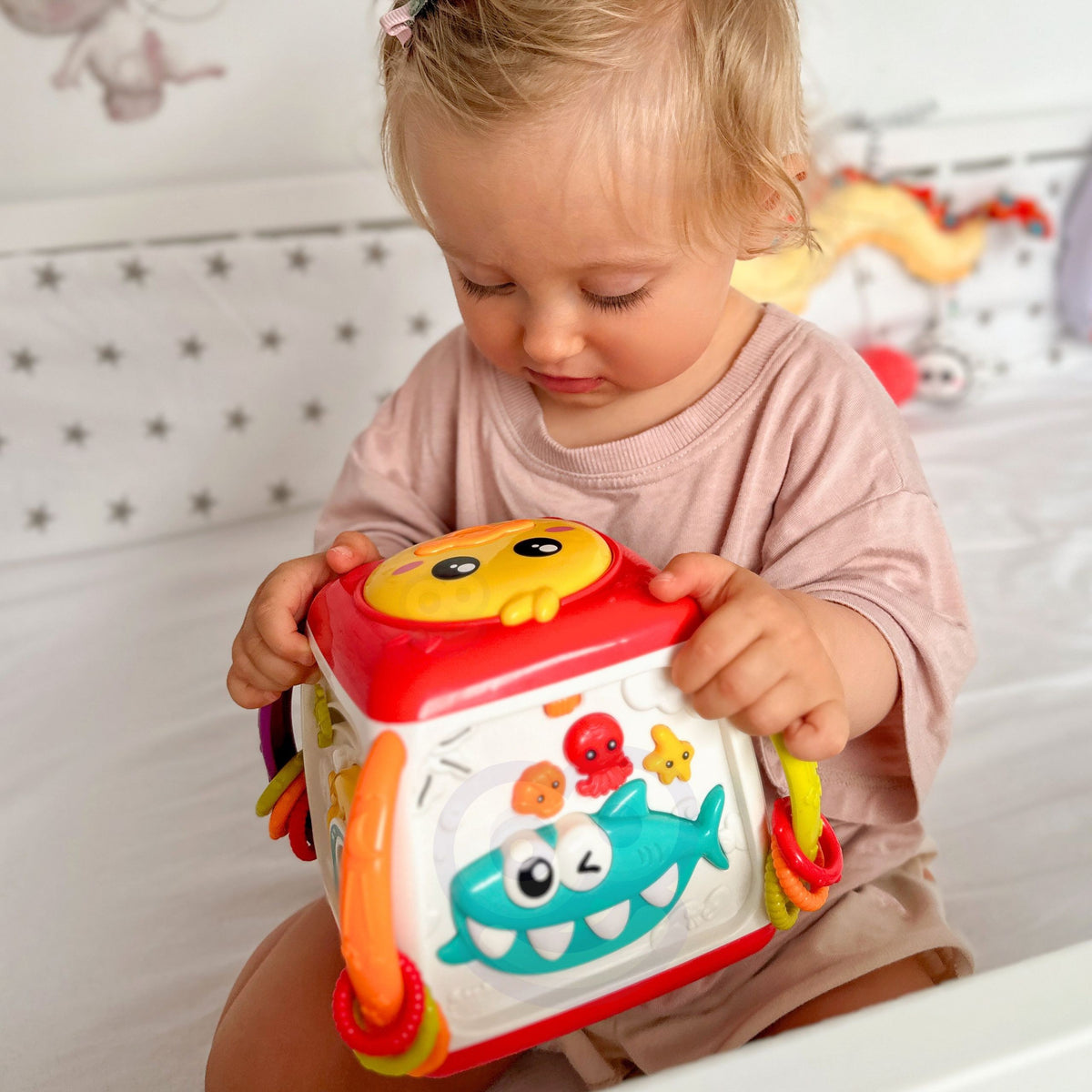 Woopie Baby aktivitāšu kubs – krāsaini grozāmi zobrati