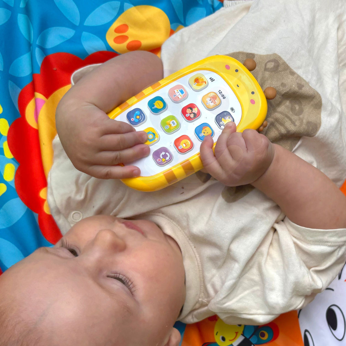 Pink baby toy phone with colourful sound buttons