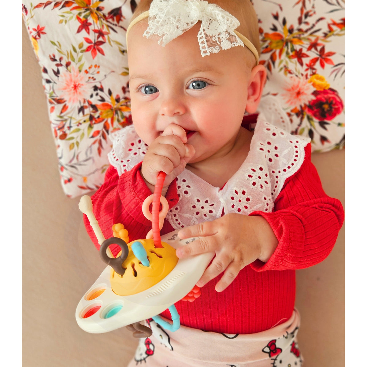 Sensory UFO toy – three soft buttons and a sliding button