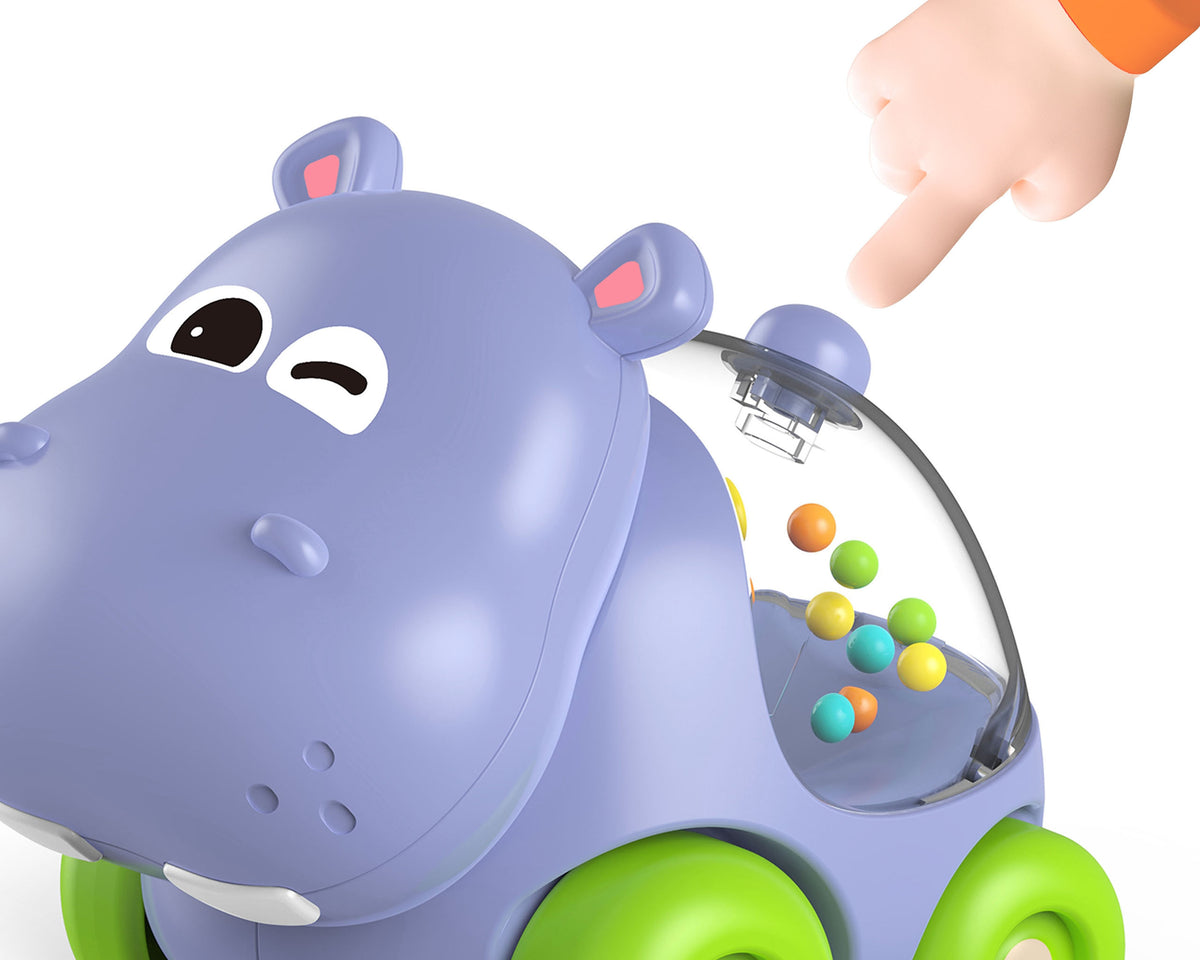 Woopie Baby nīlzirga mašīnīte – griežamas grabošas bumbiņas