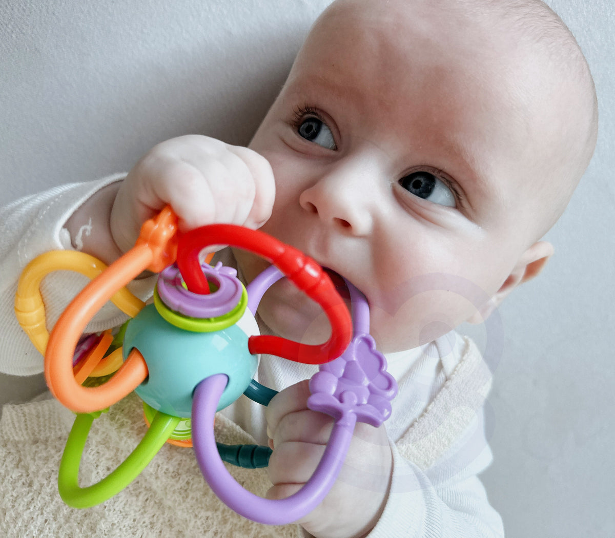 Woopie Baby twisty rattle teether – sliding pieces