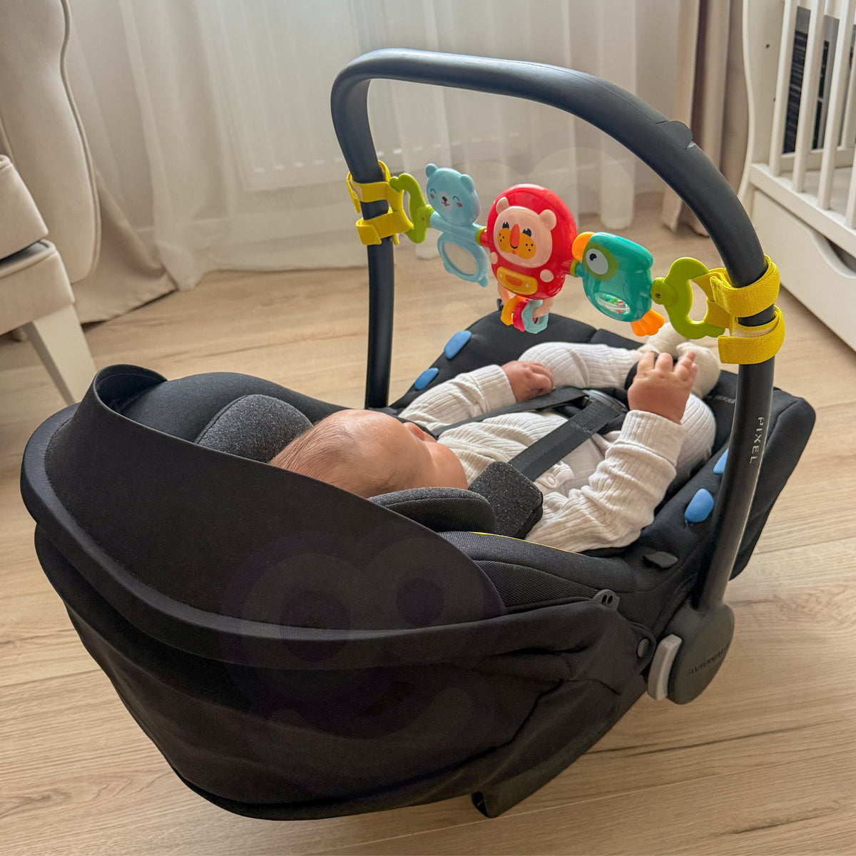 Woopie Baby sensorais panelis – putniņš-grabulis un gredzeni