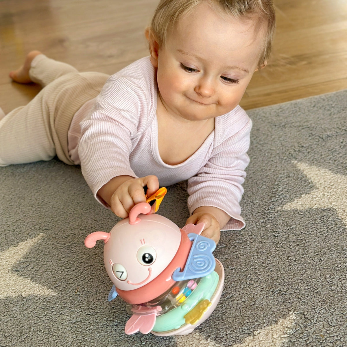 Woopie Baby muzikālais vaņka-staņka – mazulis uzliek gredzenu