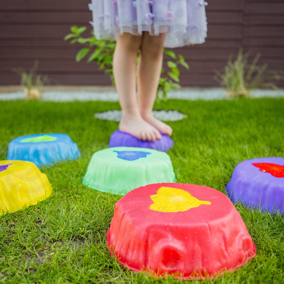 Woopie glowing stepping stones – child balancing on stones