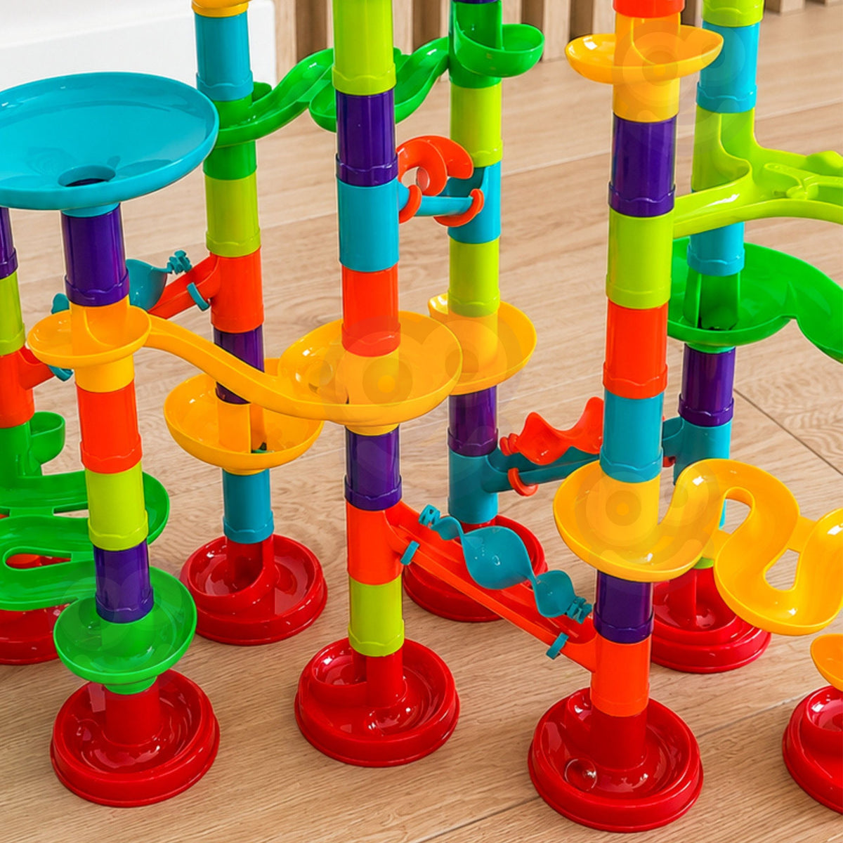 Tall marble run with spirals, tubes and funnels