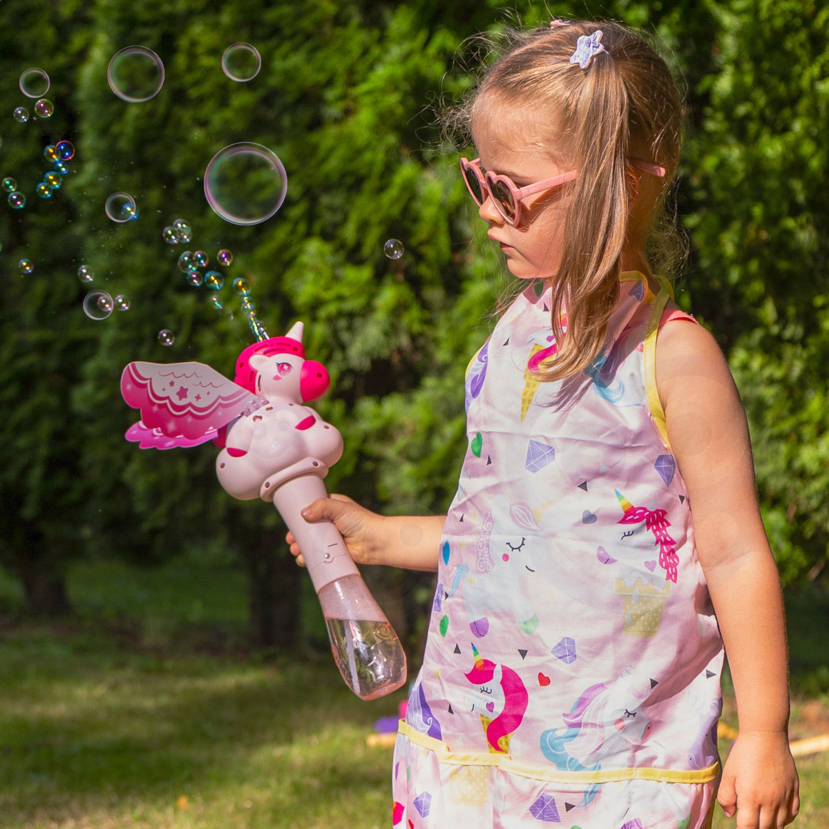 Stream of soap bubbles flowing from the unicorn