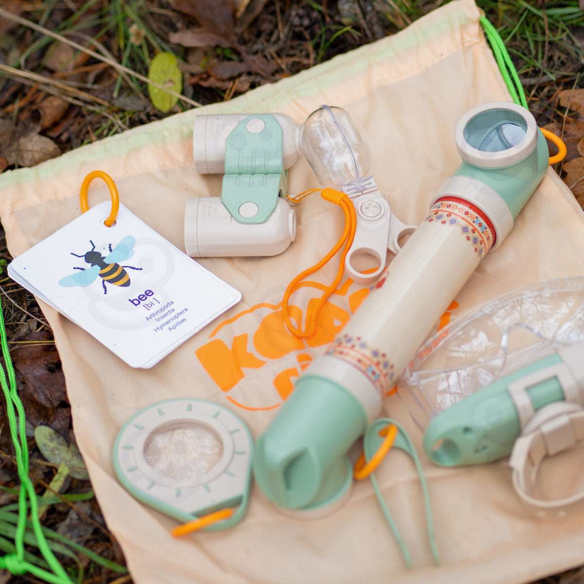 Child exploring the garden with the Little Explorer kit