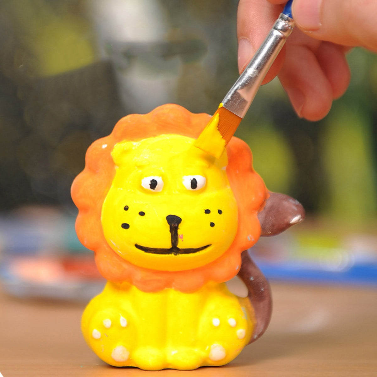 Painted plaster animal figures made with the kit