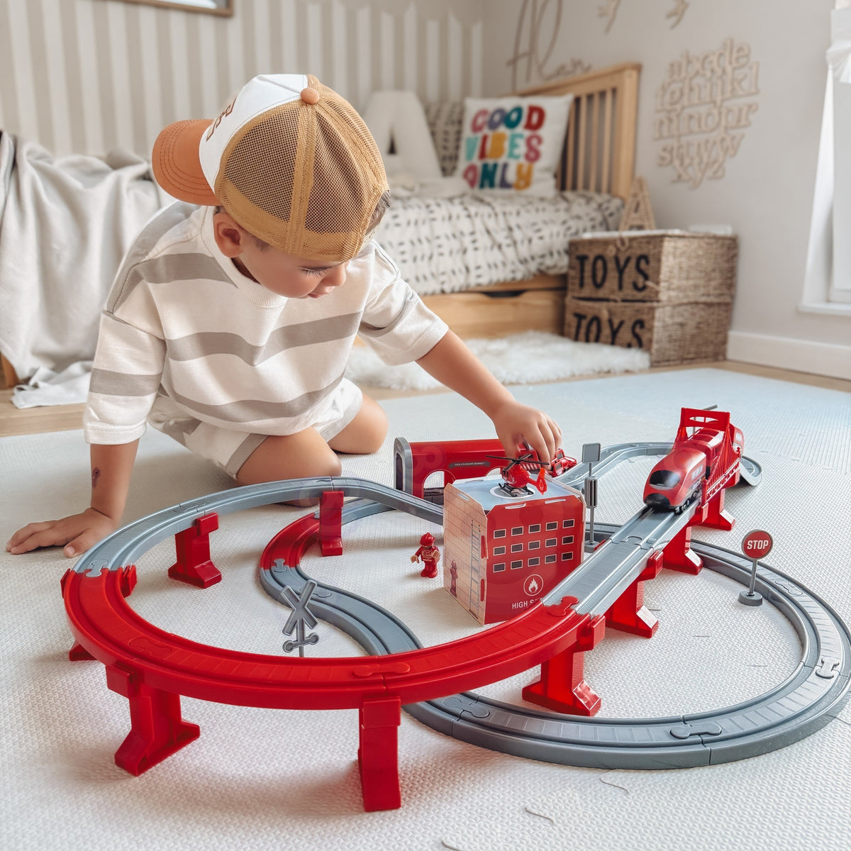 Electric locomotive with two magnetic wagons on the track