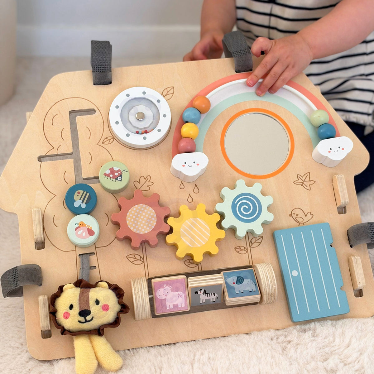 Wooden activity board – stands on a table or attaches to a cot