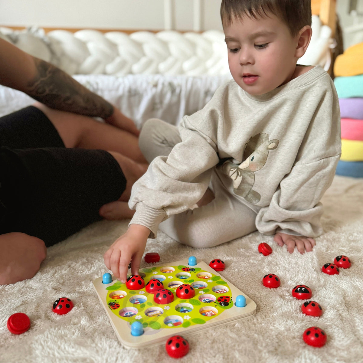 Wooden ladybug memory board with picture covers