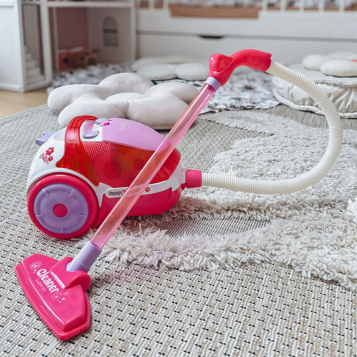 Woopie pink toy vacuum – child helping to clean