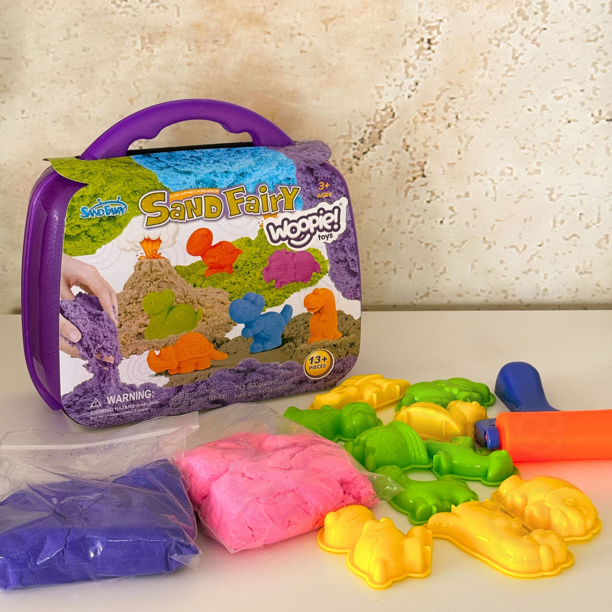 Dinosaur kinetic sand – purple case with a handle
