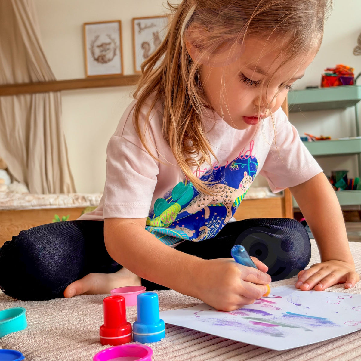 Colours appearing on magic paper with the special brush