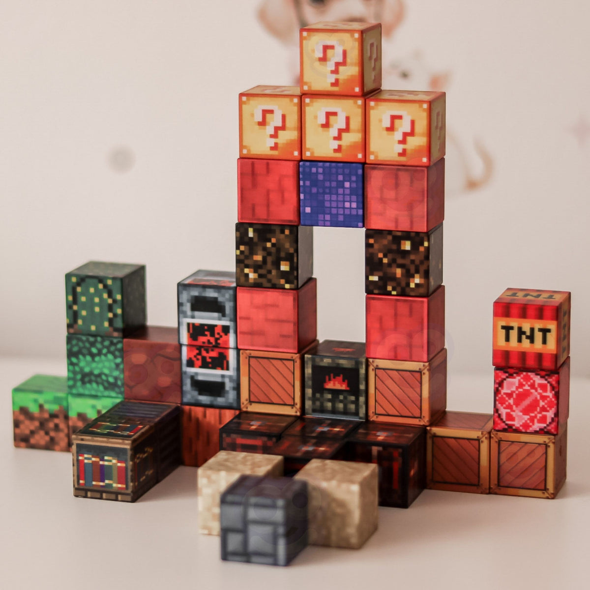 Pixel-style figure built from magnetic cubes