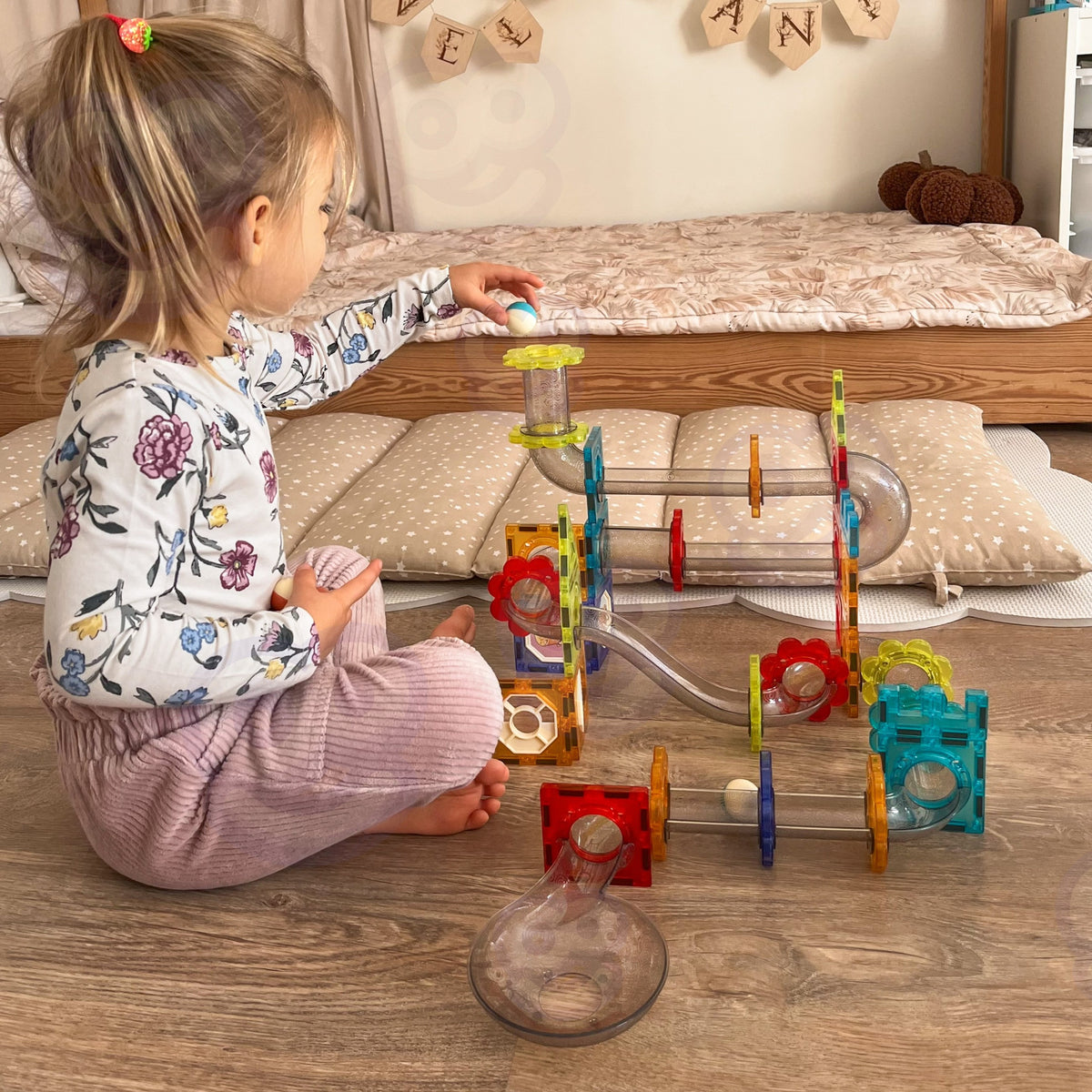 Multi-level marble run built from magnetic blocks