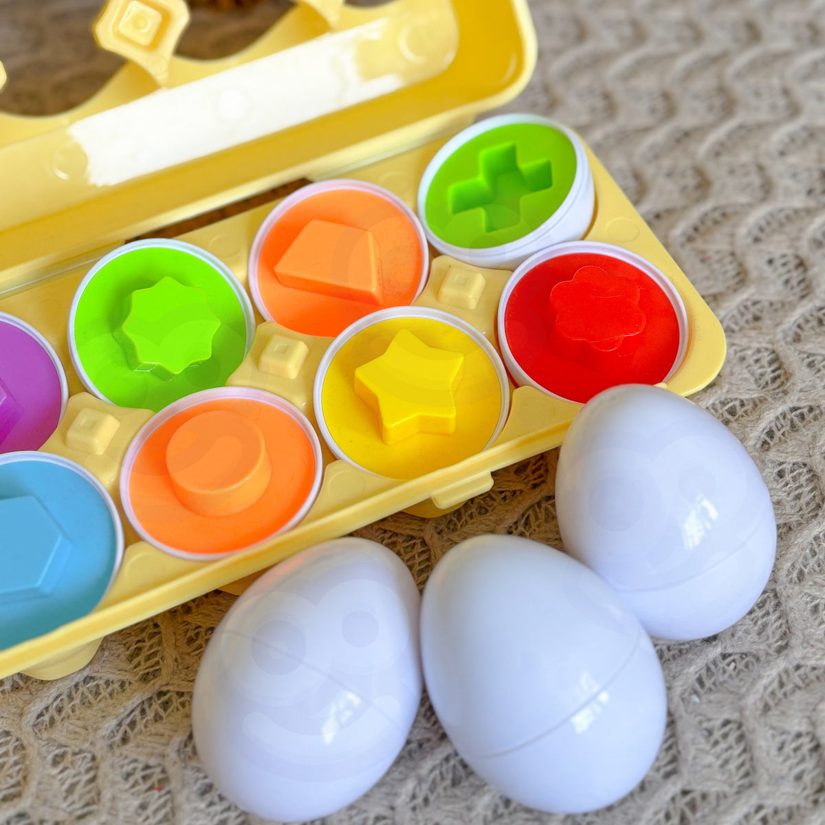 Montessori egg puzzle – heart, star, flower, arrow and more