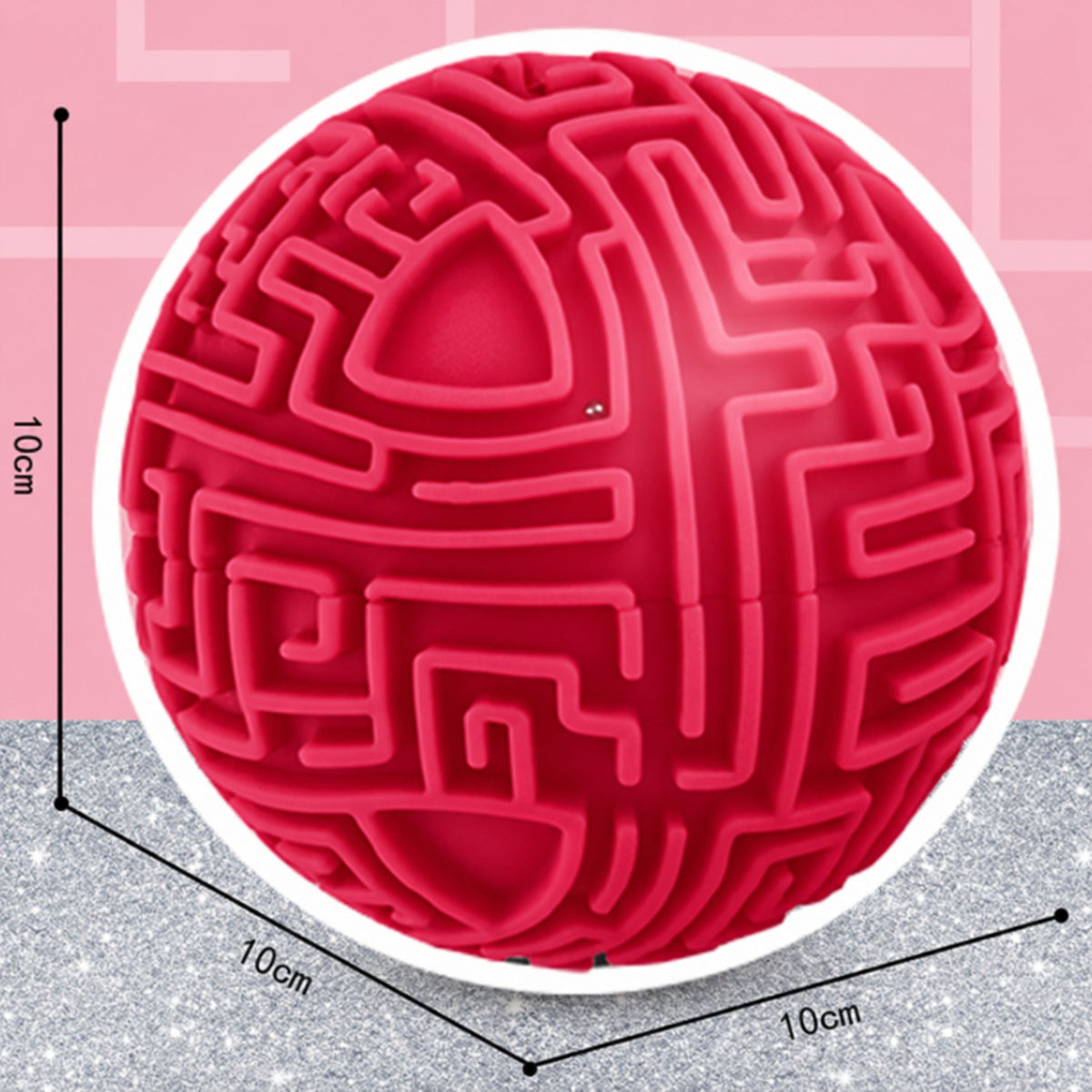 Red 3D maze ball puzzle in colourful packaging