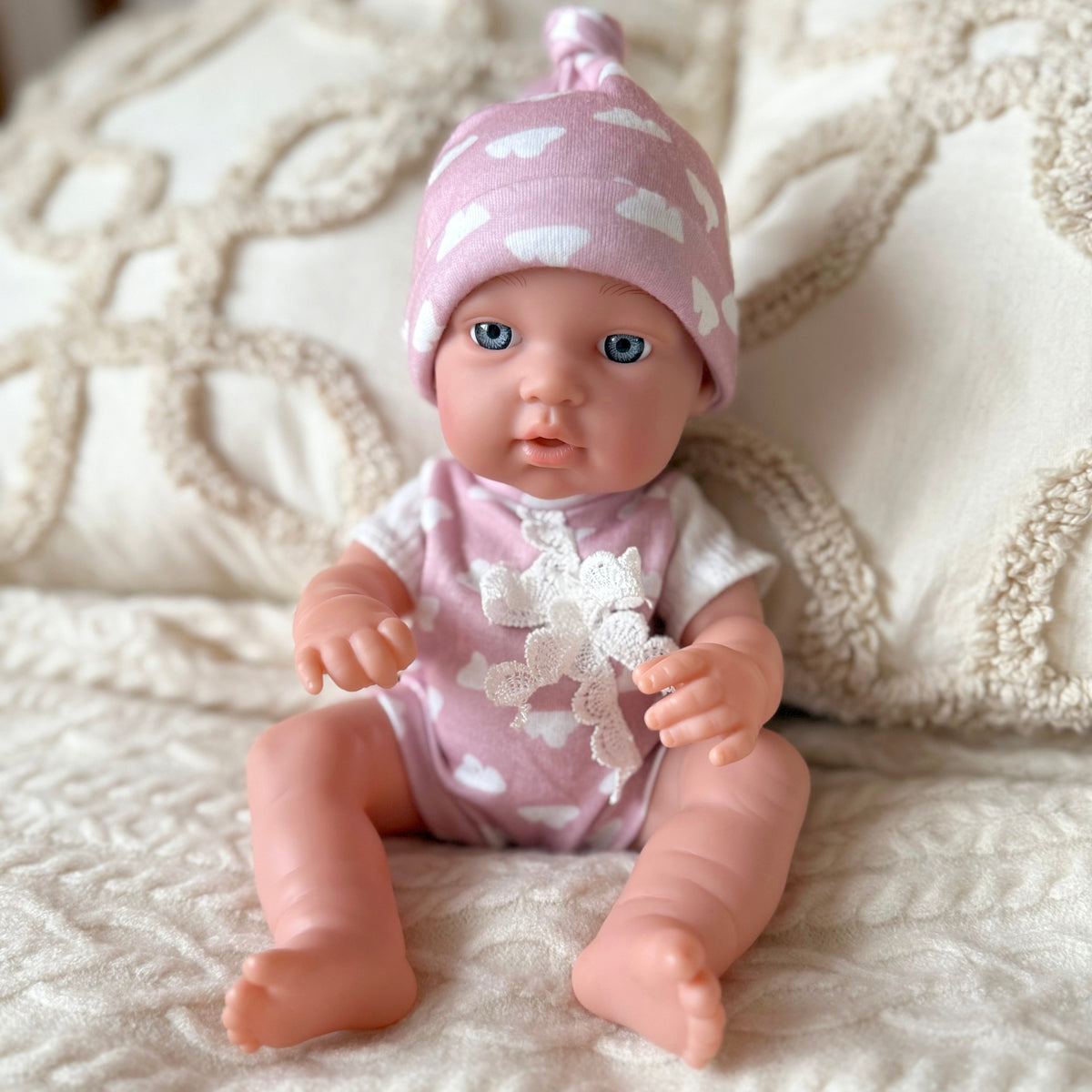 Woopie Royal baby doll 36 cm – doll holding a pink bottle