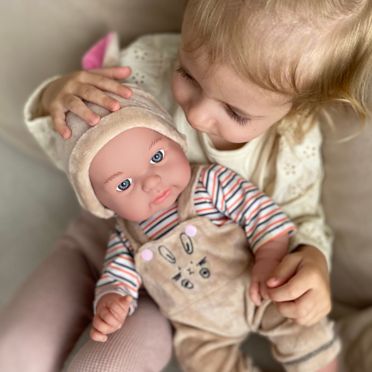 Woopie Royal baby doll in bunny outfit – doll sitting upright