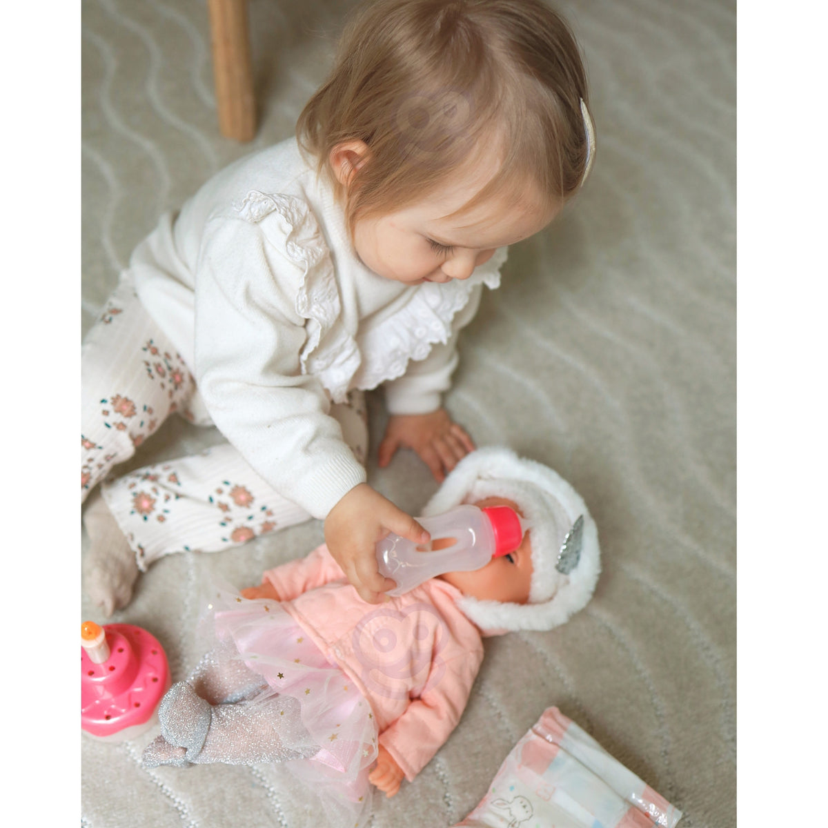 Woopie Royal Little Sophie doll – doll sitting by the cake