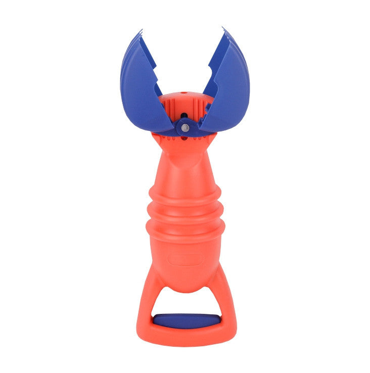 Woopie crab claw sand grabber – on the beach