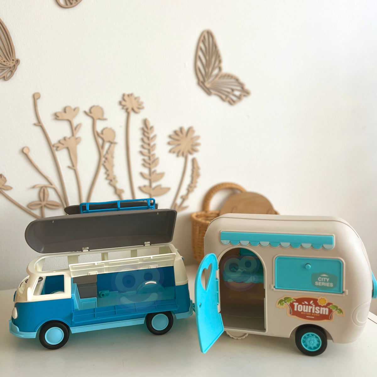 Camper and trailer decorated with stickers